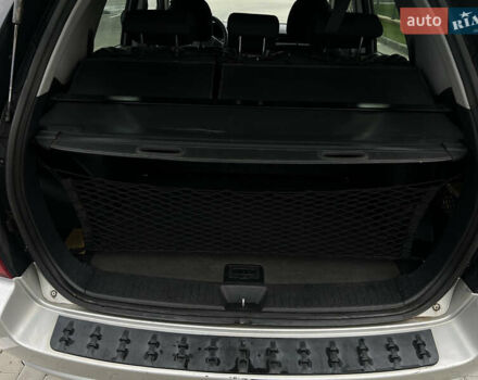 Серый Киа Sportage, объемом двигателя 1.99 л и пробегом 230 тыс. км за 8000 $, фото 22 на Automoto.ua