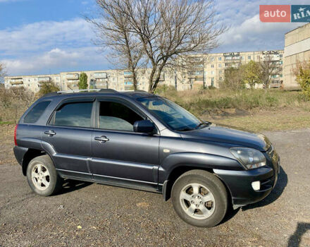 Серый Киа Sportage, объемом двигателя 2 л и пробегом 261 тыс. км за 6700 $, фото 2 на Automoto.ua