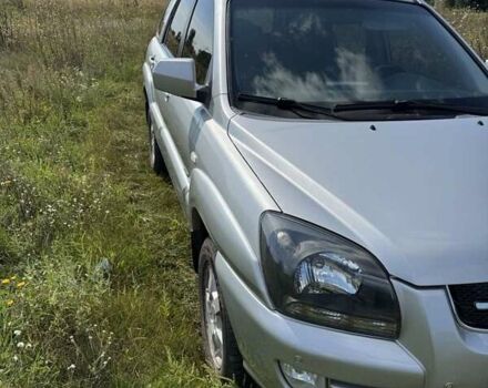 Серый Киа Sportage, объемом двигателя 2 л и пробегом 222 тыс. км за 7700 $, фото 7 на Automoto.ua