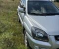 Серый Киа Sportage, объемом двигателя 2 л и пробегом 222 тыс. км за 7700 $, фото 7 на Automoto.ua