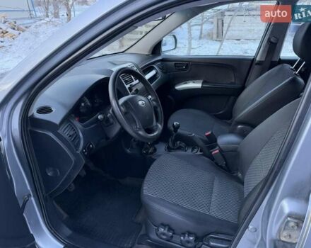 Серый Киа Sportage, объемом двигателя 2 л и пробегом 235 тыс. км за 6999 $, фото 11 на Automoto.ua