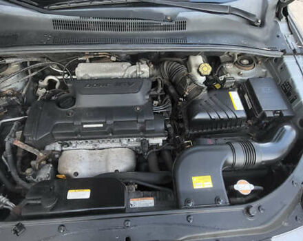 Сірий Кіа Sportage, об'ємом двигуна 2 л та пробігом 199 тис. км за 8690 $, фото 26 на Automoto.ua