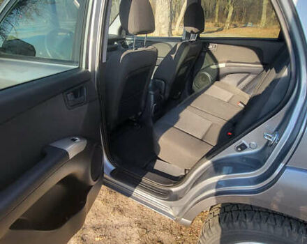 Сірий Кіа Sportage, об'ємом двигуна 2 л та пробігом 199 тис. км за 8690 $, фото 17 на Automoto.ua