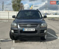 Серый Киа Sportage, объемом двигателя 2 л и пробегом 250 тыс. км за 7500 $, фото 1 на Automoto.ua