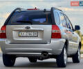 Серый Киа Sportage, объемом двигателя 2 л и пробегом 208 тыс. км за 6990 $, фото 2 на Automoto.ua