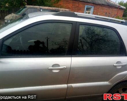 Серый Киа Sportage, объемом двигателя 2 л и пробегом 246 тыс. км за 8000 $, фото 2 на Automoto.ua