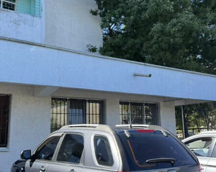 Серый Киа Sportage, объемом двигателя 2 л и пробегом 150 тыс. км за 7750 $, фото 4 на Automoto.ua