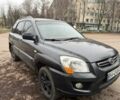 Серый Киа Sportage, объемом двигателя 2 л и пробегом 196 тыс. км за 7000 $, фото 1 на Automoto.ua