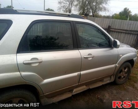 Серый Киа Sportage, объемом двигателя 2 л и пробегом 246 тыс. км за 8000 $, фото 4 на Automoto.ua