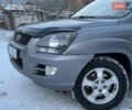 Серый Киа Sportage, объемом двигателя 2 л и пробегом 235 тыс. км за 6999 $, фото 3 на Automoto.ua