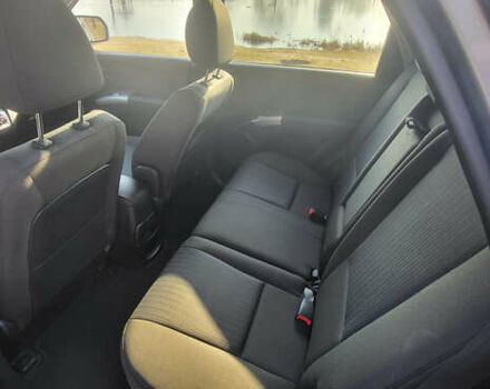 Сірий Кіа Sportage, об'ємом двигуна 2 л та пробігом 199 тис. км за 8690 $, фото 14 на Automoto.ua