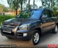 Сірий Кіа Sportage, об'ємом двигуна 2 л та пробігом 160 тис. км за 7700 $, фото 1 на Automoto.ua