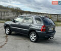 Серый Киа Sportage, объемом двигателя 2 л и пробегом 167 тыс. км за 7600 $, фото 7 на Automoto.ua