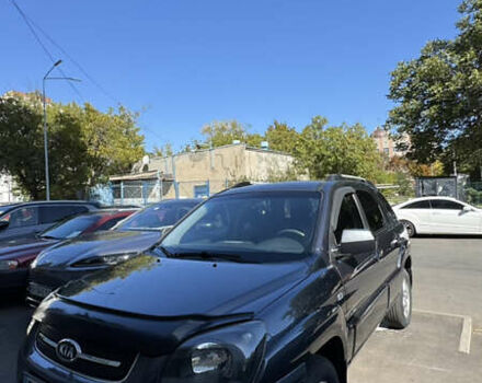 Серый Киа Sportage, объемом двигателя 2 л и пробегом 150 тыс. км за 7750 $, фото 1 на Automoto.ua