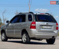 Серый Киа Sportage, объемом двигателя 2 л и пробегом 208 тыс. км за 6999 $, фото 3 на Automoto.ua