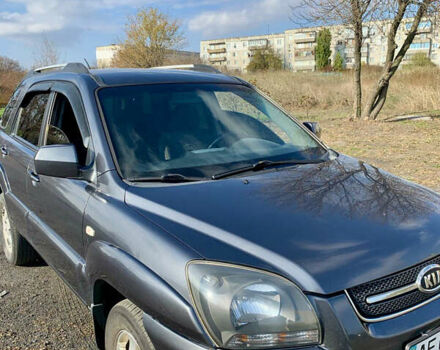 Серый Киа Sportage, объемом двигателя 2 л и пробегом 261 тыс. км за 6700 $, фото 1 на Automoto.ua