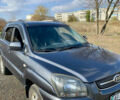 Серый Киа Sportage, объемом двигателя 2 л и пробегом 261 тыс. км за 6700 $, фото 1 на Automoto.ua