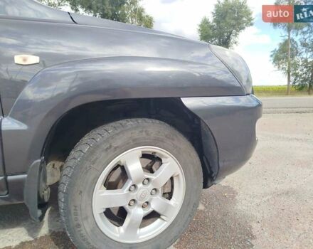 Серый Киа Sportage, объемом двигателя 2 л и пробегом 217 тыс. км за 7400 $, фото 5 на Automoto.ua