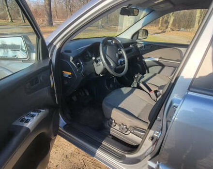 Сірий Кіа Sportage, об'ємом двигуна 2 л та пробігом 199 тис. км за 8690 $, фото 18 на Automoto.ua