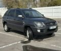 Серый Киа Sportage, объемом двигателя 2 л и пробегом 250 тыс. км за 7500 $, фото 2 на Automoto.ua