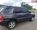 Серый Киа Sportage, объемом двигателя 2 л и пробегом 217 тыс. км за 7400 $, фото 2 на Automoto.ua