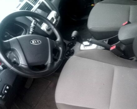 Серый Киа Sportage, объемом двигателя 2 л и пробегом 246 тыс. км за 8000 $, фото 1 на Automoto.ua