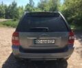 Серый Киа Sportage, объемом двигателя 2 л и пробегом 228 тыс. км за 9000 $, фото 4 на Automoto.ua