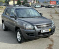 Серый Киа Sportage, объемом двигателя 2 л и пробегом 167 тыс. км за 7600 $, фото 1 на Automoto.ua