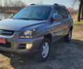 Сірий Кіа Sportage, об'ємом двигуна 2 л та пробігом 199 тис. км за 8690 $, фото 1 на Automoto.ua