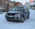 Серый Киа Sportage, объемом двигателя 2 л и пробегом 235 тыс. км за 6999 $, фото 1 на Automoto.ua