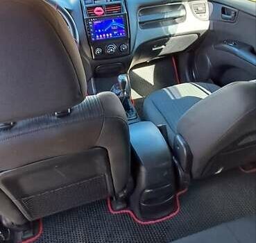 Серый Киа Sportage, объемом двигателя 1.98 л и пробегом 223 тыс. км за 8200 $, фото 33 на Automoto.ua