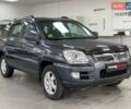 Сірий Кіа Sportage, об'ємом двигуна 2 л та пробігом 235 тис. км за 7490 $, фото 1 на Automoto.ua