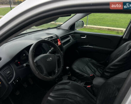 Серый Киа Sportage, объемом двигателя 1.99 л и пробегом 230 тыс. км за 8000 $, фото 17 на Automoto.ua