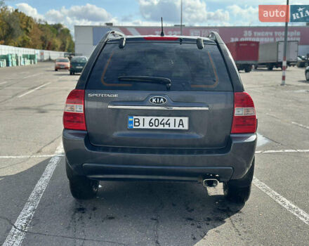 Серый Киа Sportage, объемом двигателя 2 л и пробегом 250 тыс. км за 7500 $, фото 4 на Automoto.ua