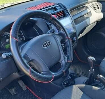 Серый Киа Sportage, объемом двигателя 1.98 л и пробегом 223 тыс. км за 8200 $, фото 25 на Automoto.ua