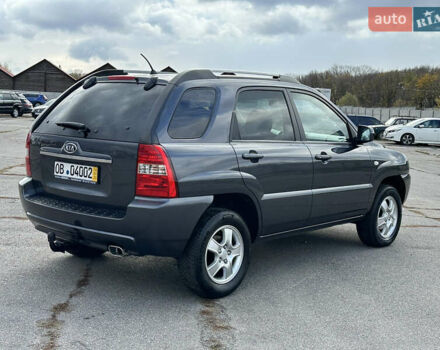 Серый Киа Sportage, объемом двигателя 2 л и пробегом 167 тыс. км за 7600 $, фото 4 на Automoto.ua