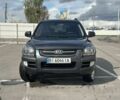 Серый Киа Sportage, объемом двигателя 2 л и пробегом 250 тыс. км за 7500 $, фото 1 на Automoto.ua