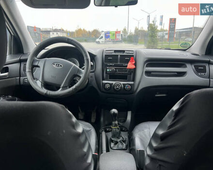 Серый Киа Sportage, объемом двигателя 1.99 л и пробегом 230 тыс. км за 8000 $, фото 14 на Automoto.ua