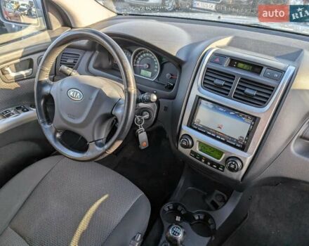 Сірий Кіа Sportage, об'ємом двигуна 2 л та пробігом 192 тис. км за 8450 $, фото 39 на Automoto.ua