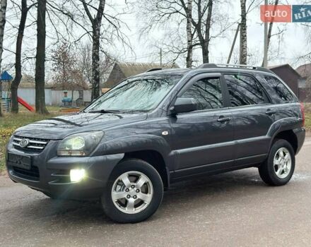 Серый Киа Sportage, объемом двигателя 2 л и пробегом 165 тыс. км за 7490 $, фото 1 на Automoto.ua