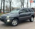 Серый Киа Sportage, объемом двигателя 2 л и пробегом 165 тыс. км за 7490 $, фото 1 на Automoto.ua
