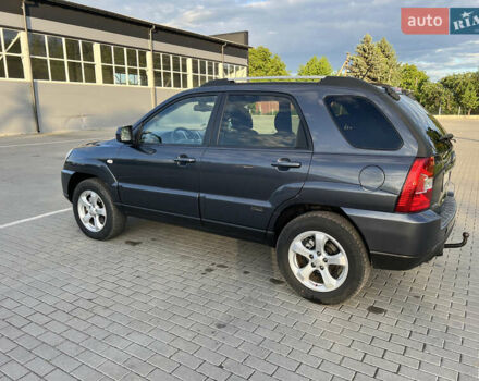Серый Киа Sportage, объемом двигателя 1.99 л и пробегом 270 тыс. км за 9000 $, фото 12 на Automoto.ua