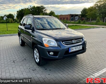 Серый Киа Sportage, объемом двигателя 2 л и пробегом 270 тыс. км за 9000 $, фото 4 на Automoto.ua