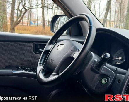 Серый Киа Sportage, объемом двигателя 2 л и пробегом 165 тыс. км за 7490 $, фото 10 на Automoto.ua