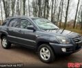 Серый Киа Sportage, объемом двигателя 2 л и пробегом 165 тыс. км за 7490 $, фото 1 на Automoto.ua