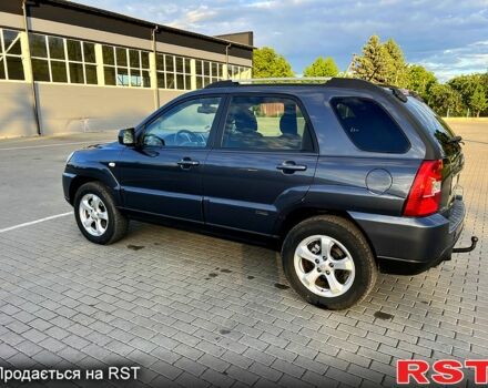 Серый Киа Sportage, объемом двигателя 2 л и пробегом 270 тыс. км за 9000 $, фото 7 на Automoto.ua