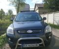 Серый Киа Sportage, объемом двигателя 2 л и пробегом 133 тыс. км за 9500 $, фото 1 на Automoto.ua