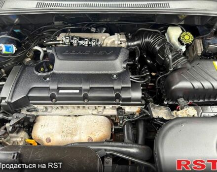 Серый Киа Sportage, объемом двигателя 2 л и пробегом 165 тыс. км за 7490 $, фото 12 на Automoto.ua