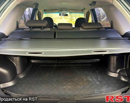 Серый Киа Sportage, объемом двигателя 2 л и пробегом 165 тыс. км за 7490 $, фото 7 на Automoto.ua