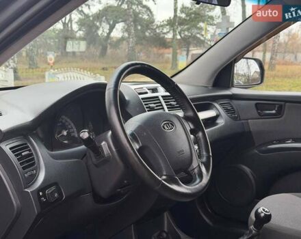 Серый Киа Sportage, объемом двигателя 2 л и пробегом 165 тыс. км за 7490 $, фото 12 на Automoto.ua